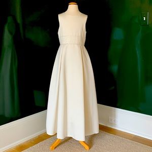 Girls Ivory sleeveless satin long dress. By Sweet Beginnings.